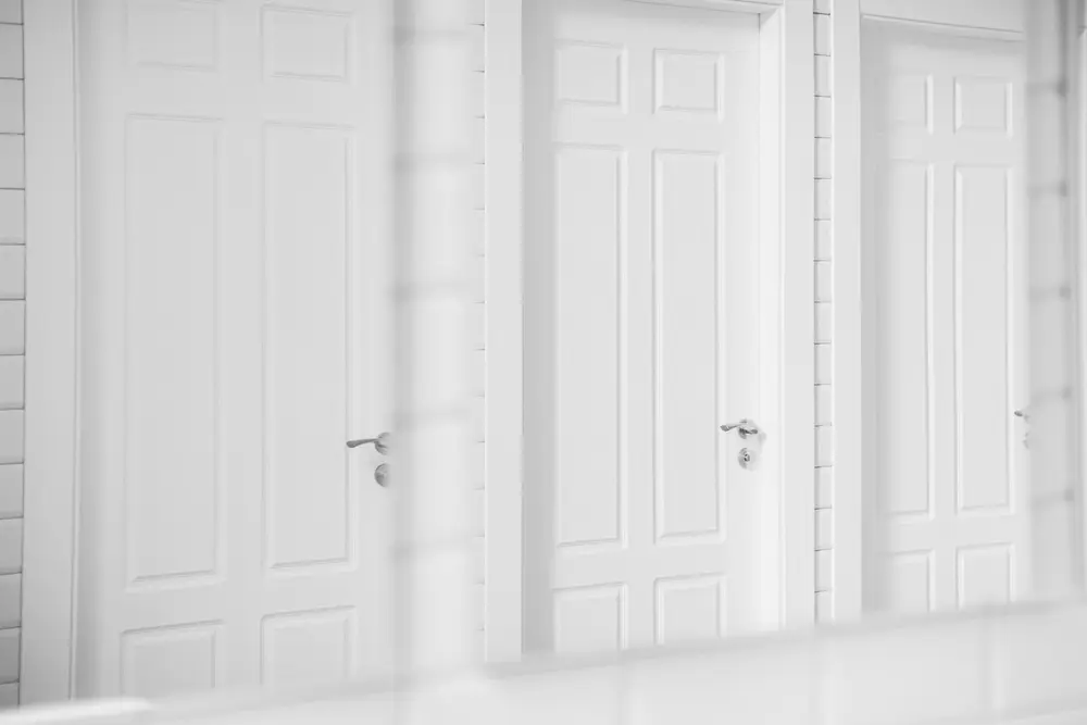 Door replacement with new white paneled doors in Nashua, NH